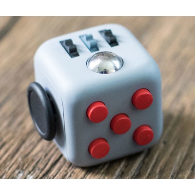 Fidget Cube: Six-sided pocketable toy.