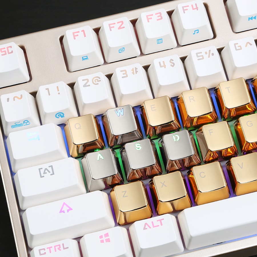 white and gold keycaps